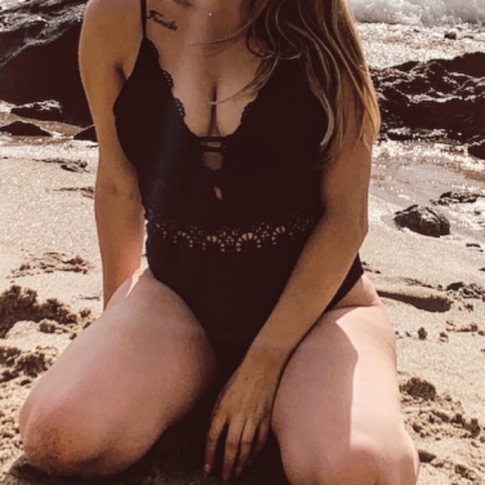 One piece plunging front and open back